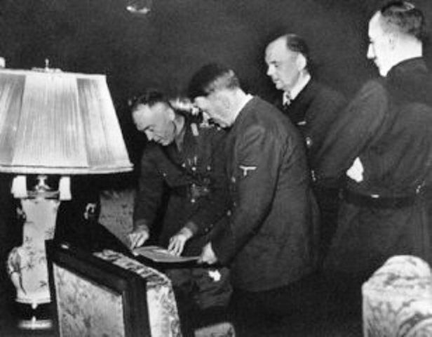 Romanian ruler Ion Antonescu signs the Three-Power Agreement with Hitler